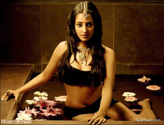 Click to Enlarge -Sizzling Raima Sen 2010 Calendar Shoot